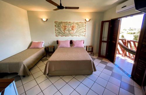 Prado Hotel | Pet-Friendly Pousada Coral de Fogo with Ocean Views