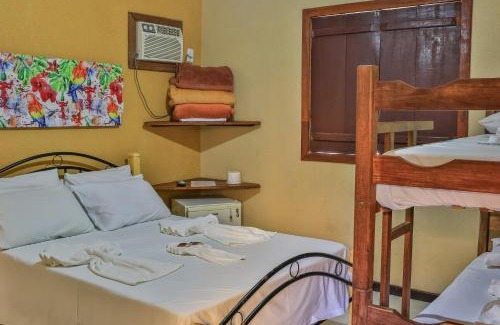 Itaunas Hotel | Relax at Pousada Das Araras with Oceanfront Pool Access