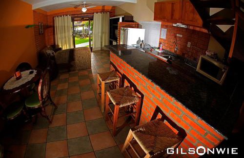 Praia do Rosa Hotel | Unwind at Pousada Descanso do Rei with Oceanfront Views