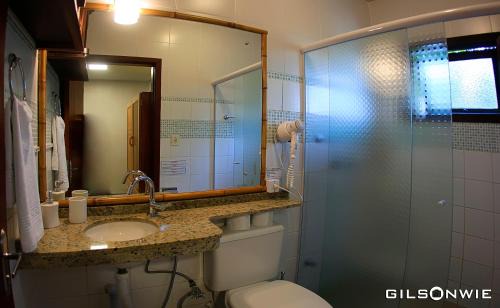 Praia do Rosa Hotel | Unwind at Pousada Descanso do Rei with Oceanfront Views