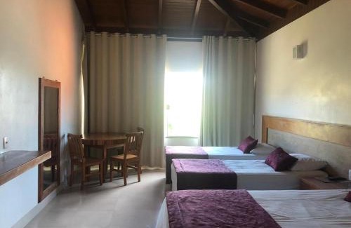 Capitolio Hotel | Idyllic Pousada do Rio Turvo: Oceanfront Retreat for Families