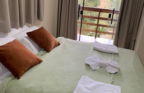Sao Sebastiao das Aguas Claras Hotel | Relax at Pousada Evolução: Pool, Spa & Breakfast Included