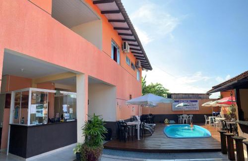 Praia de Leste House | Oceanfront Retreat at Pousada Fênix with Pool & Dining