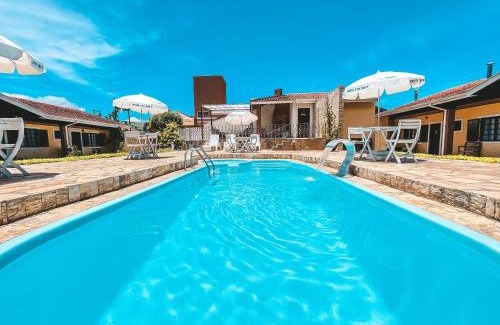 Sao Bento do Sapucai Hotel | Pet-Friendly Getaway at Pousada Flor de Ipe, Rated 9/10