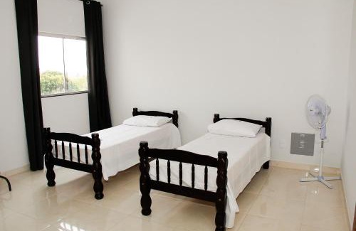 Trindade Hotel | Discover Pousada Flor Dos Ipês: Family-Friendly Retreat