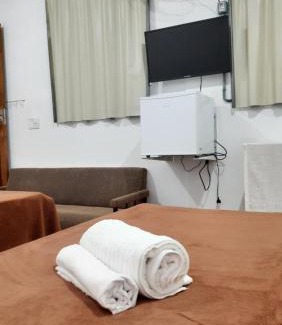 Santa Rita de Jacutinga Hotel | Experience Comfort at Pousada Iasbeck - Pet Friendly Retreat