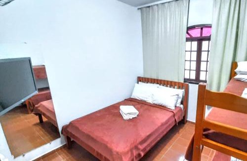 Santa Rita de Jacutinga Hotel | Experience Comfort at Pousada Iasbeck - Pet Friendly Retreat