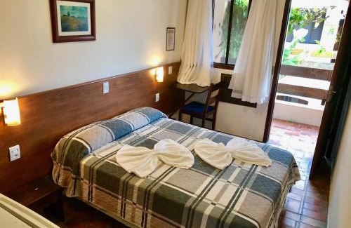 Ilha Comprida Hotel | Discover Pousada Icaraí: Oceanfront Gem with Pool Access