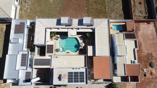 Olimpia Hotel | Exceptional Pousada Jardim Botanico with Oceanfront Pool