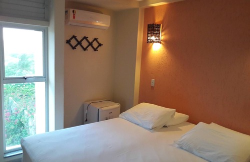 Conde Hotel | Discover Pousada Laguna: Ocean Views & Poolside Relaxation