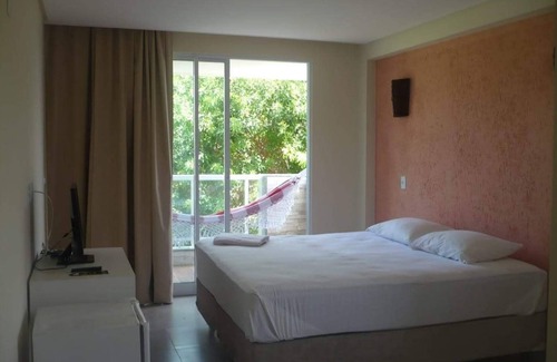 Conde Hotel | Discover Pousada Laguna: Ocean Views & Poolside Relaxation