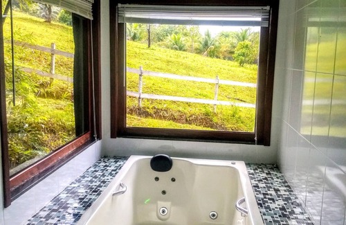 Cachoeiras de Macacu Cottage | Explore Relaxation at Pousada Mãe Natureza with Spa & Pool