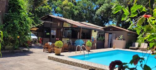 Arraial d'Ajuda Hotel | Oceanfront Pousada Macunaima: Pet-Friendly Paradise Awaits