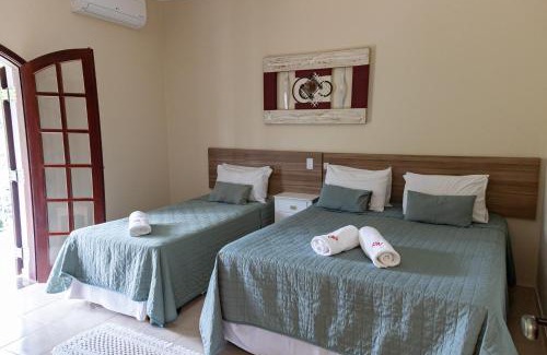 Aguas de Lindoia Hotel | Inviting Pousada Nefelibatas: Pool, Hot Tub & Family Friendly