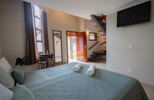Aguas de Lindoia Hotel | Inviting Pousada Nefelibatas: Pool, Hot Tub & Family Friendly