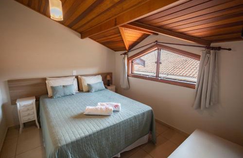 Aguas de Lindoia Hotel | Inviting Pousada Nefelibatas: Pool, Hot Tub & Family Friendly