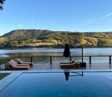Capitolio Hotel | Discover Pousada Noah: Oceanfront Retreat with Pool Access