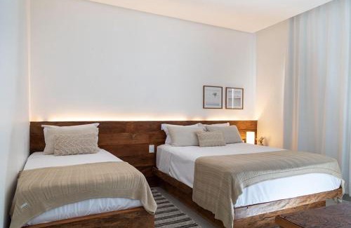 Capitolio Hotel | Discover Pousada Noah: Oceanfront Retreat with Pool Access