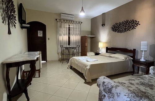 Quatis Hotel | Discover Comfort at Pousada Pôr do Sol with Pool & Breakfast