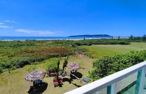 Palhoca Hotel | Oceanfront Pousada Pegadas na Areia: Pet Friendly Retreat