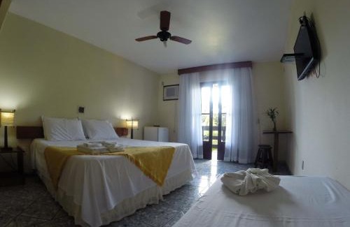 Praia do Rosa Hotel | Relax at Pousada Porto dos Casais: Oceanfront Retreat