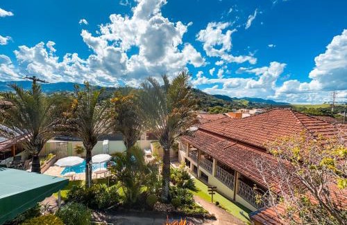 Sao Bento do Sapucai Hotel | Discover Pousada Quinta dos Colibris: Oceanfront Oasis