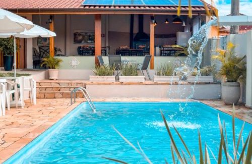 Sao Bento do Sapucai Hotel | Discover Pousada Quinta dos Colibris: Oceanfront Oasis