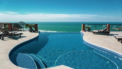 Praia do Rosa Hotel | Discover Oceanfront Bliss at Pousada Rêmora - Rated 9.1