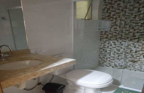 Camburi Apartment | Relax at Pousada Recanto Bromélias with Oceanfront Views