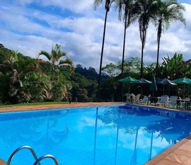 Sao Sebastiao das Aguas Claras Hotel | Pousada Recanto do Chalé: Pet-Friendly Oceanfront Retreat