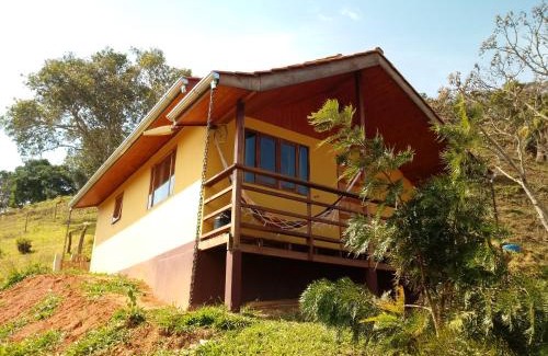 Aiuruoca Cabin | Discover Pousada Recanto do Ypê: Rated 9.6, Pet Friendly & More