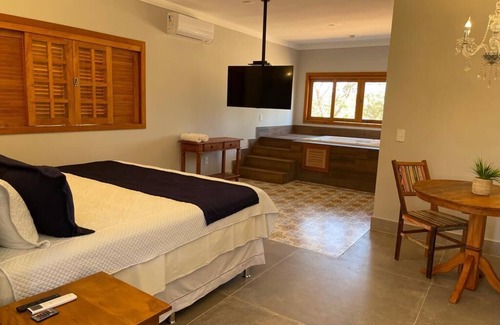 Pirenopolis Hotel | Relax at Pousada Renacer Park with Pool & Family Amenities