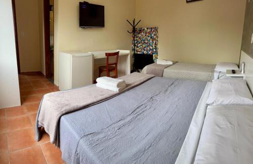 Penedo Hotel | Discover Pousada Suarez: Pet-Friendly Retreat with Pool