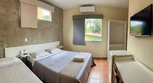 Penedo Hotel | Discover Pousada Suarez: Pet-Friendly Retreat with Pool