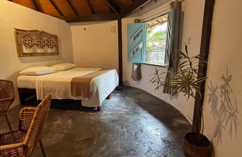 Arraial d'Ajuda Hotel | Discover Pousada Terra Coral: Pool, Breakfast & Family-Friendly