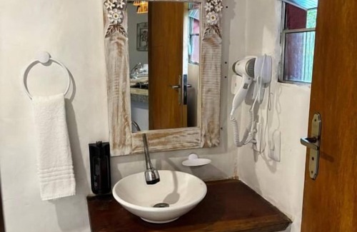 Arraial d'Ajuda Hotel | Discover Pousada Terra Coral: Pool, Breakfast & Family-Friendly