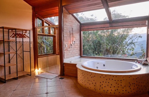 Sao Jose dos Campos Cabin | Discover Pousada Teto do Cafundó: Perfect Getaway with Hot Tub