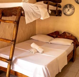 Ponta do Anel Hotel | Discover Pousada Vila Bella - Pool & Dining at Praia do Macapá