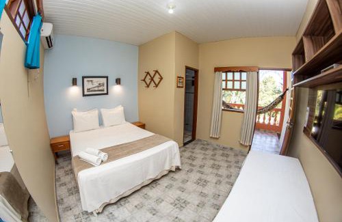 Centro Hotel | Pousada Villa Mariana: Oceanfront Retreat with Pool & Dining