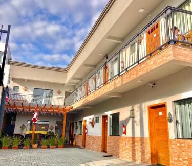 Praia da Armacao do Itapocoroi House | Explore Pousada Villa Vantino: Rated 9.5/10, Family-Friendly Stay