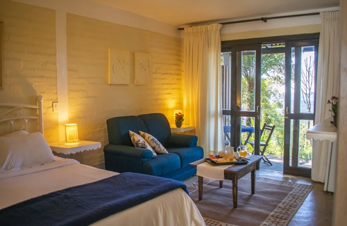 Monte Verde Hotel | VillaSerrana: Guest Rated 9.8 with Pool & Spa Amenities