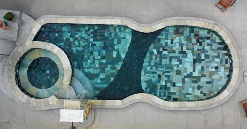 Pirenopolis Hotel | Relax at Pousada Yanah with Oceanfront Views and Pool