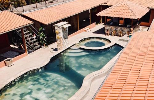 Pirenopolis Hotel | Relax at Pousada Yanah with Oceanfront Views and Pool