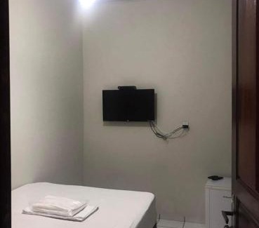 Puerto Seguro Center House | Prime Location Stay at Pousadinha - Family-Friendly Amenities