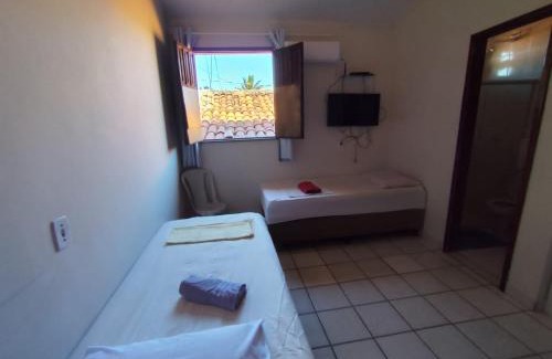 Puerto Seguro Center House | Prime Location Stay at Pousadinha - Family-Friendly Amenities