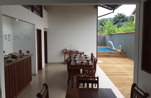 Jabaquara House | Discover Pouso Alcantara: Guest Rated 9.4 with Pool Access