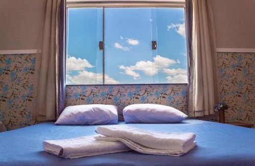 Sao Joao Batista do Gloria House | Discover Pouso Oliveira Suítes: 10/10 Guest Rated Escape