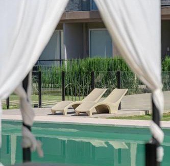 Villa Rumipal Apartment | Discover Prado del Lago: Pet-Friendly Oasis with Pool