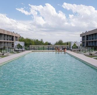 Villa Rumipal Apartment | Discover Prado del Lago: Pet-Friendly Oasis with Pool