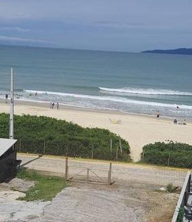 Governador Celso Ramos Apartment | Ocean View Retreat at Praia de Palmas with Pool Access